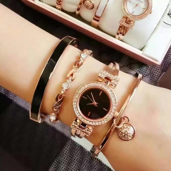 Наручные часы или браслеты копии бренда в подарок